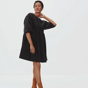 Everlane “the corduroy mini dress” in black.